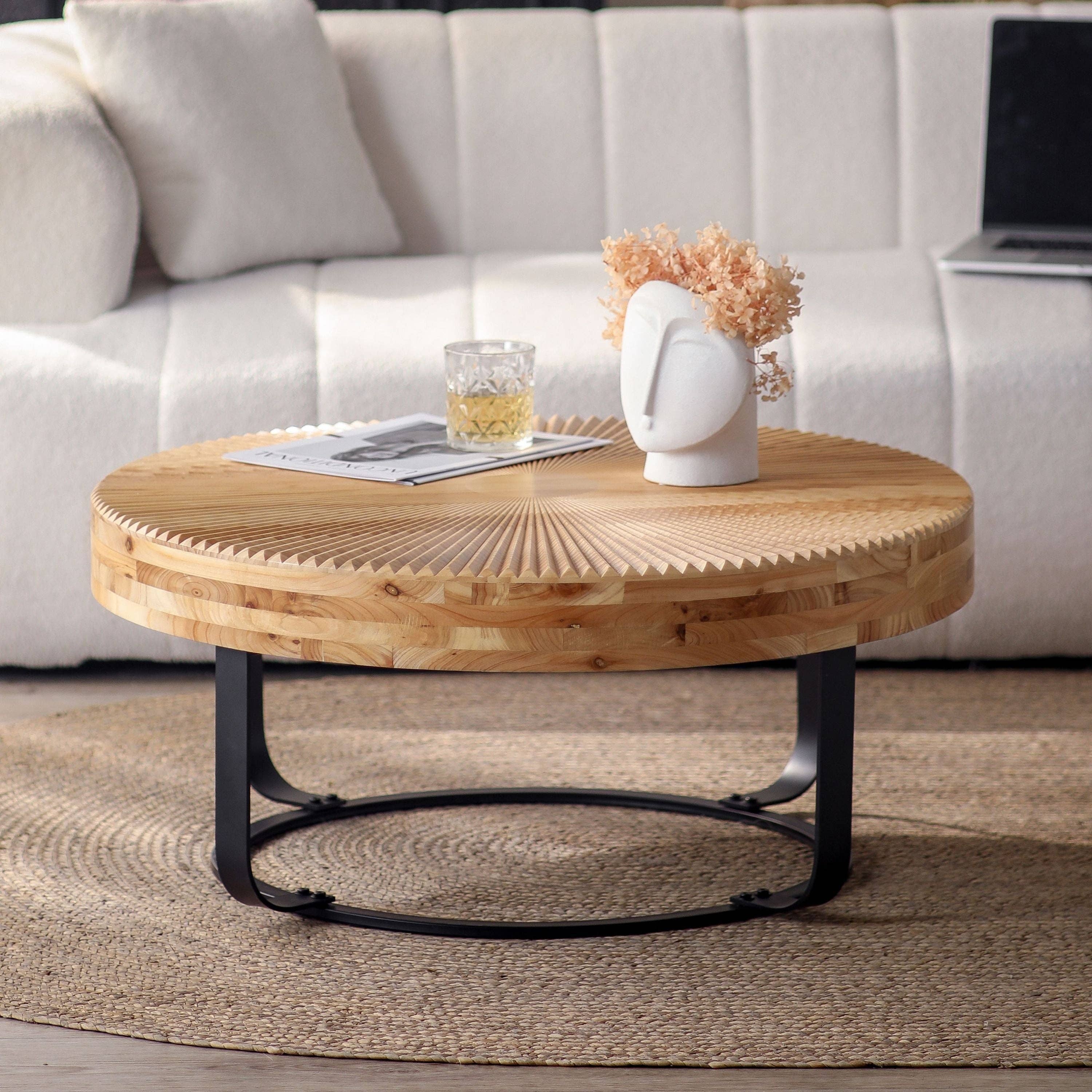 Round Wood Coffee Table with Carved Top and Metal Legs